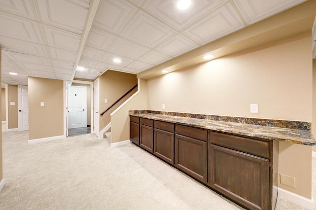 bar with light carpet, stairway, recessed lighting, and baseboards