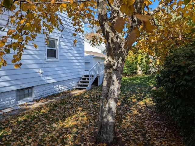 view of property exterior with stairs