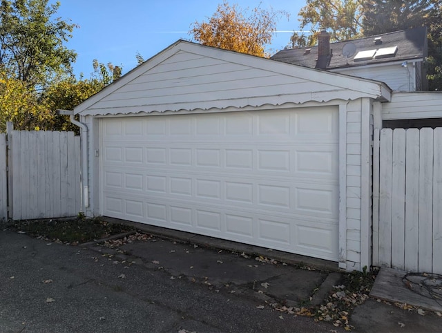 garage with fence