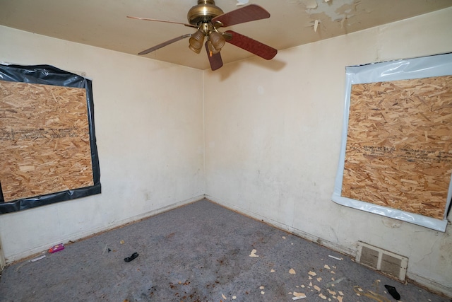 unfurnished room featuring visible vents