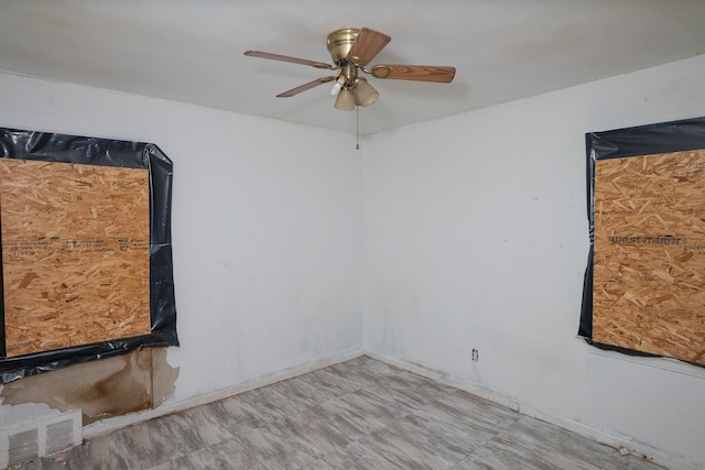 spare room with visible vents and ceiling fan