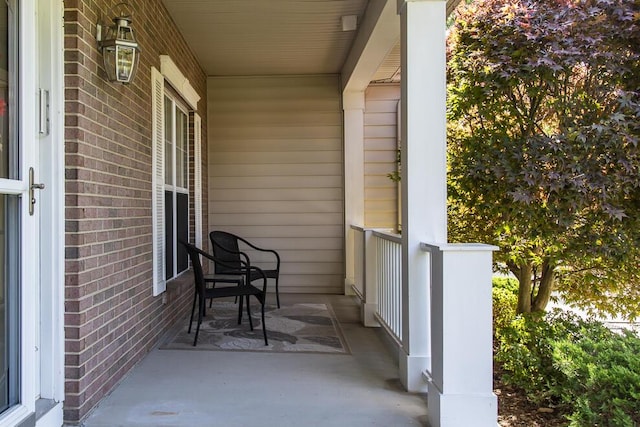 balcony featuring a porch