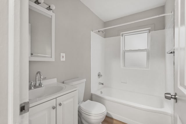 full bathroom with toilet, shower / bathing tub combination, and vanity