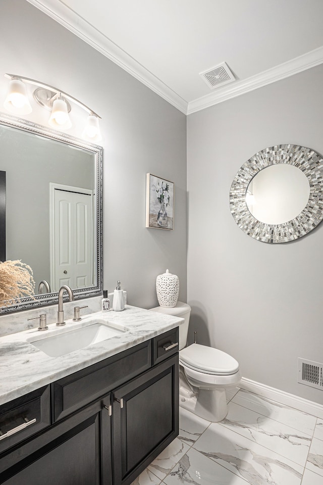 bathroom featuring visible vents, crown molding, vanity, and toilet