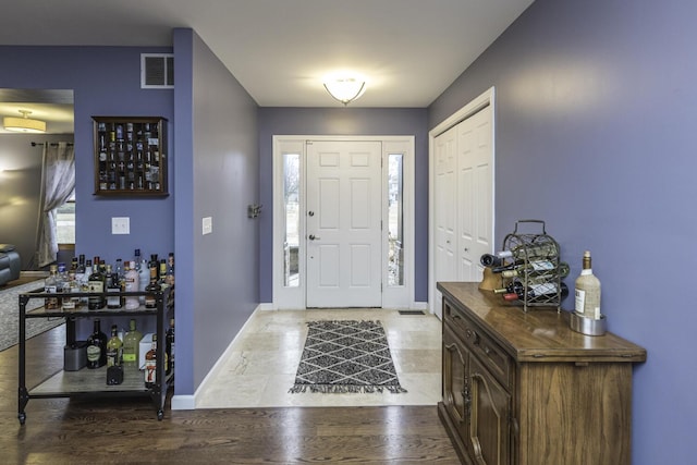 1085 Melrose Ct, Saline, MI 48176 - entrance foyer with baseboards and visible vents