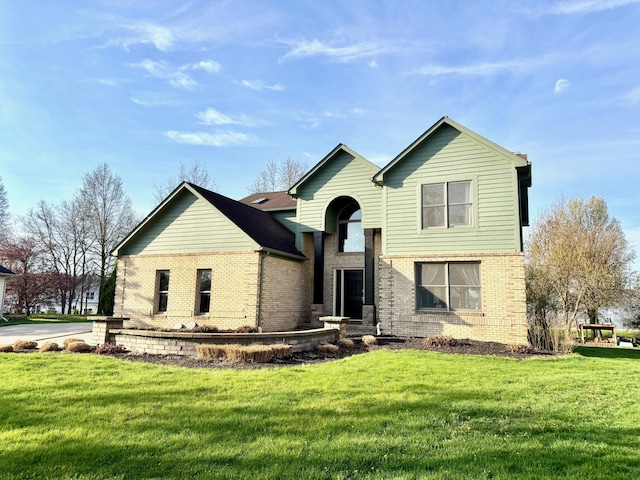 1085 Melrose Ct, Saline, MI 48176 - view of front of property featuring a front lawn and brick siding