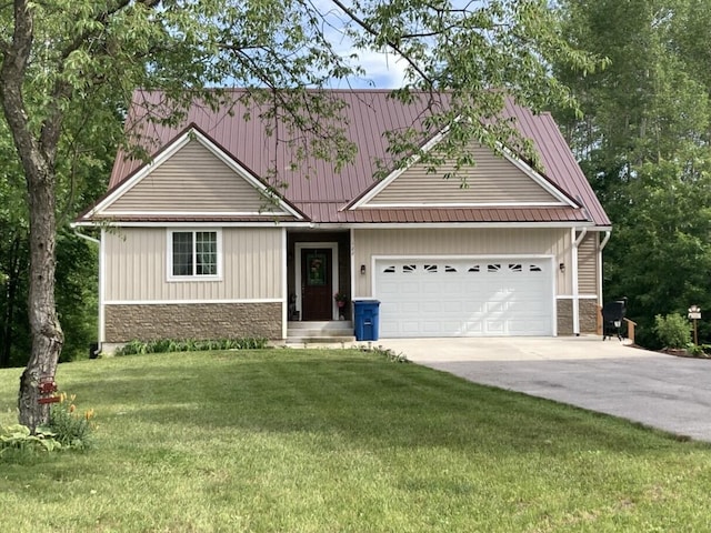 craftsman inspired home with a garage, stone siding, driveway, and a front lawn