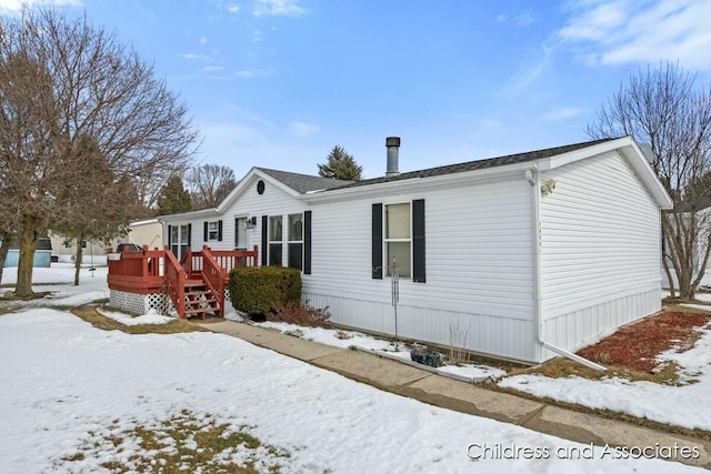 view of front of home with a deck