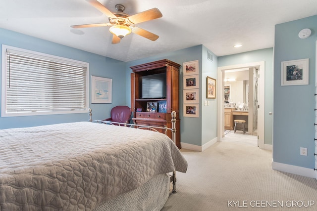 bedroom with light carpet, a ceiling fan, visible vents, and baseboards