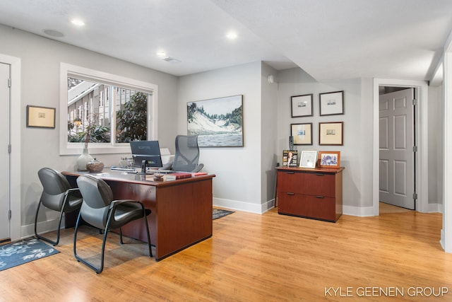 office featuring recessed lighting, light wood-style flooring, and baseboards