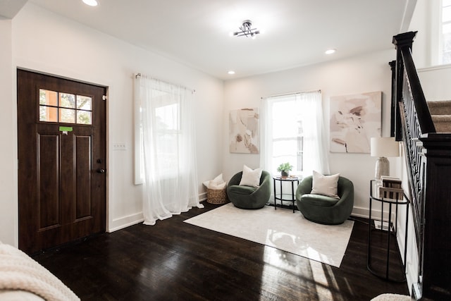 entryway featuring baseboards, stairway, dark wood-style flooring, and recessed lighting