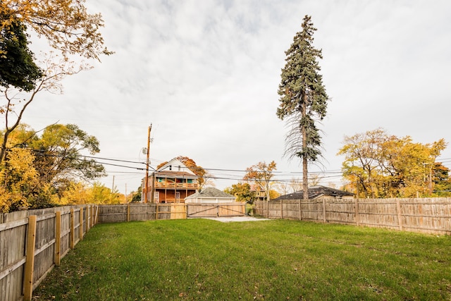 view of yard with a fenced backyard