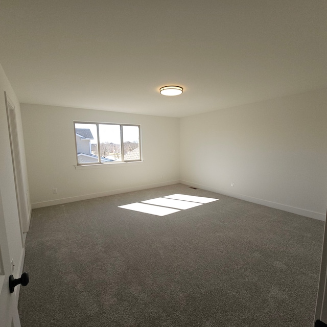 55786 Stewart Dr, Macomb, MI 48042 - carpeted spare room with baseboards