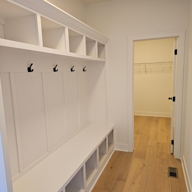 55786 Stewart Dr, Macomb, MI 48042 - mudroom featuring light wood-type flooring and baseboards