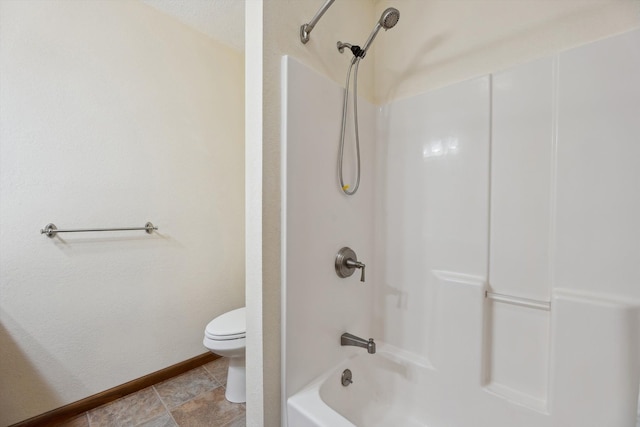 full bathroom with shower / bath combination, baseboards, and toilet