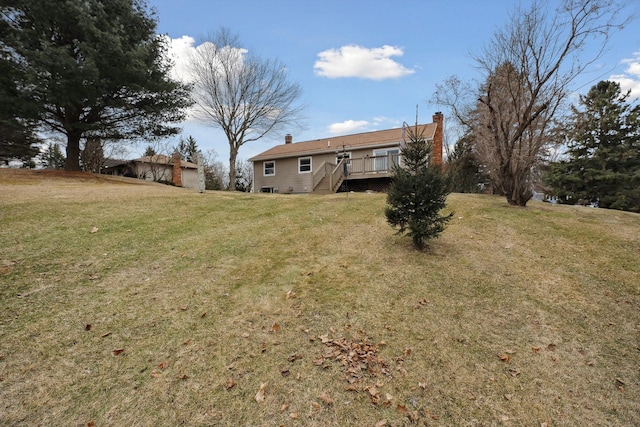 view of yard featuring a deck