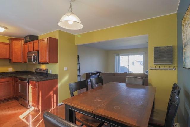 dining room featuring light wood-style floors