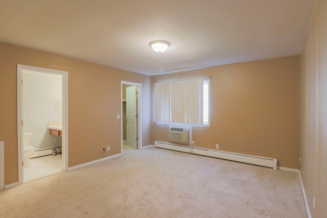 unfurnished bedroom with a wall mounted air conditioner, carpet floors, and baseboard heating