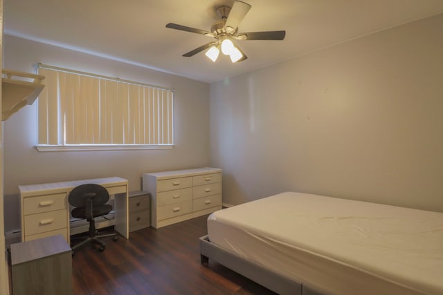 bedroom with dark wood-style floors and ceiling fan