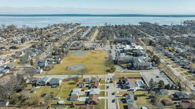 aerial view with a water view and a residential view