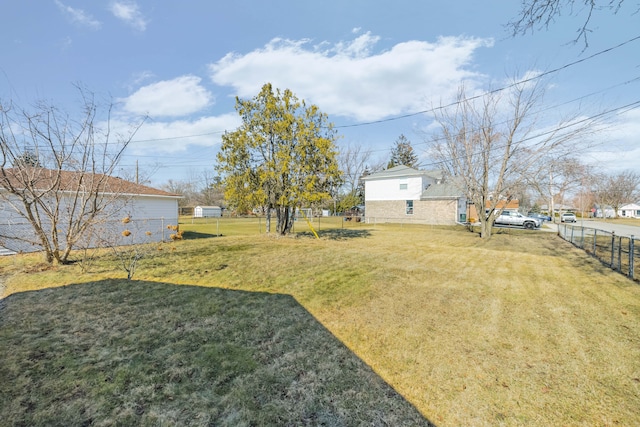 view of yard featuring fence