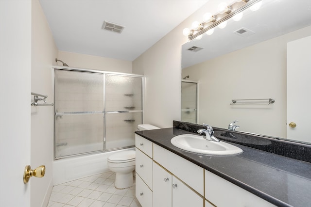 full bathroom with toilet, vanity, tile patterned flooring, and visible vents