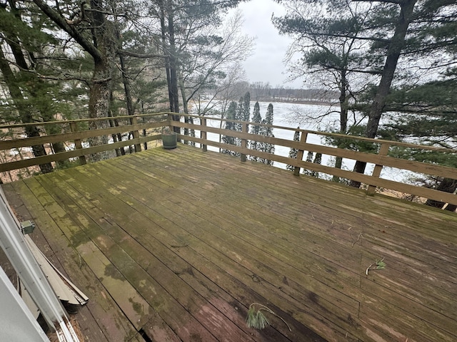 deck featuring a water view