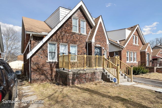 view of front of home featuring brick siding