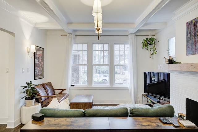 living room featuring a brick fireplace, coffered ceiling, and beam ceiling