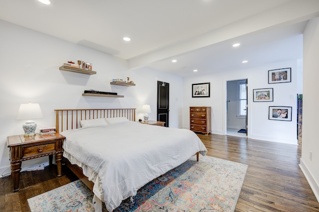 bedroom featuring beam ceiling, baseboards, wood finished floors, and recessed lighting