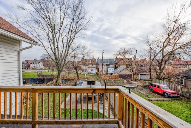 wooden terrace featuring a residential view