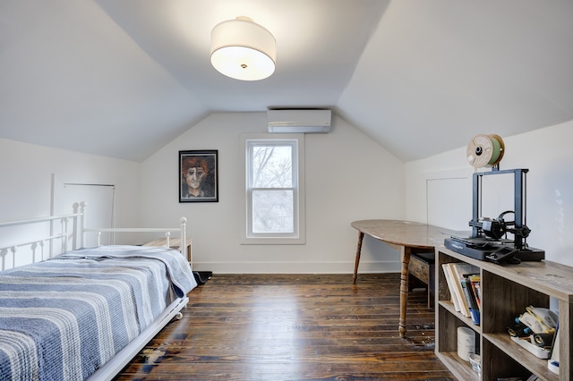 bedroom with dark wood-type flooring, lofted ceiling, baseboards, and a wall mounted AC