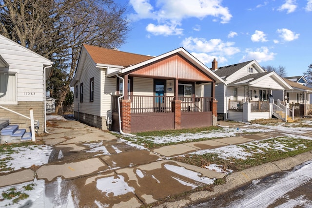 bungalow featuring covered porch