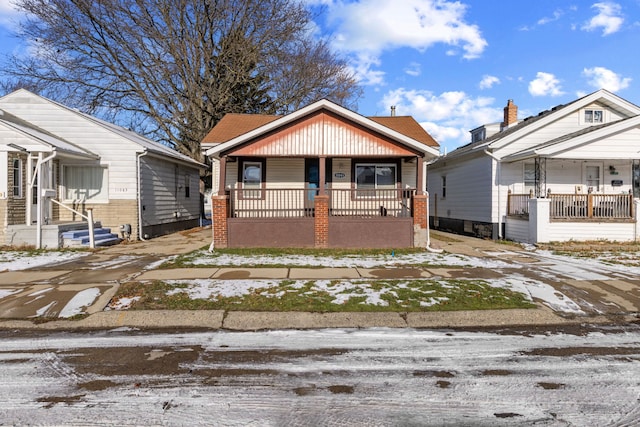 bungalow-style house with covered porch