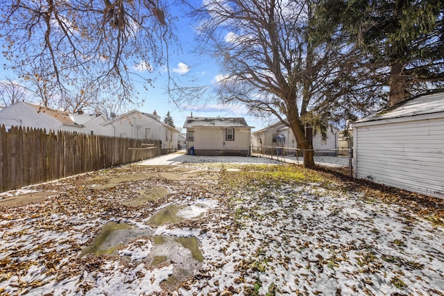 view of yard featuring an outbuilding and a fenced backyard