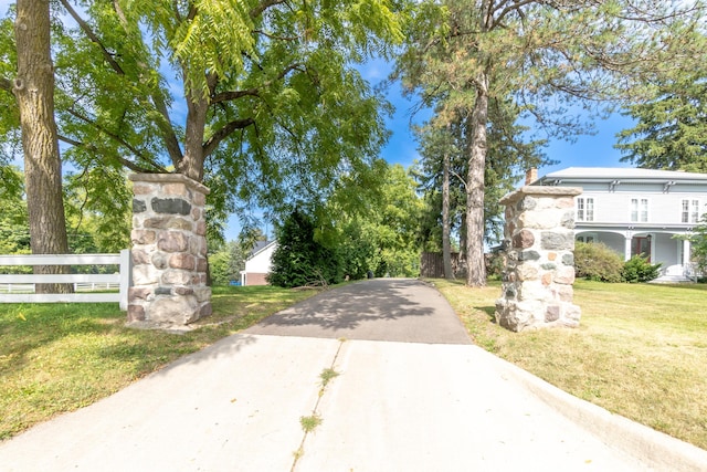 exterior space featuring concrete driveway