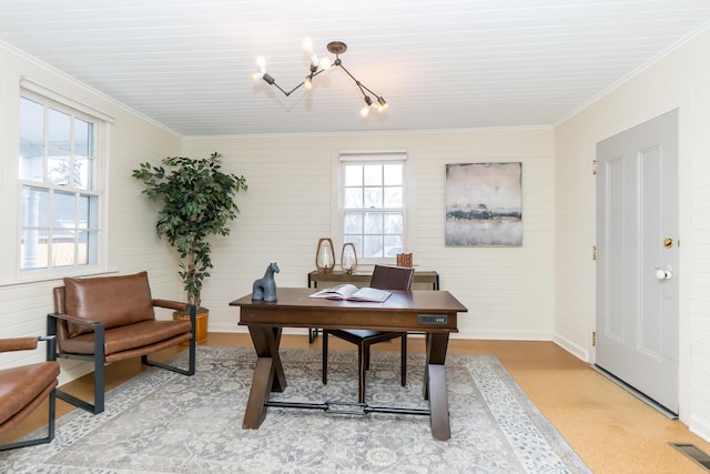 office with a healthy amount of sunlight, visible vents, crown molding, and a notable chandelier