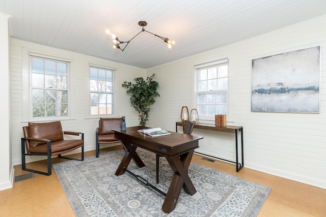 office area featuring track lighting, an inviting chandelier, visible vents, and crown molding