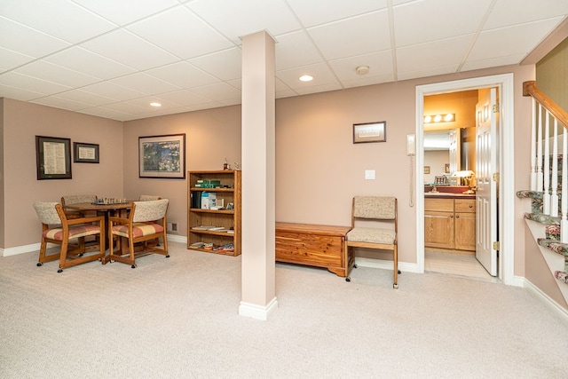 dining space with recessed lighting, baseboards, and light colored carpet