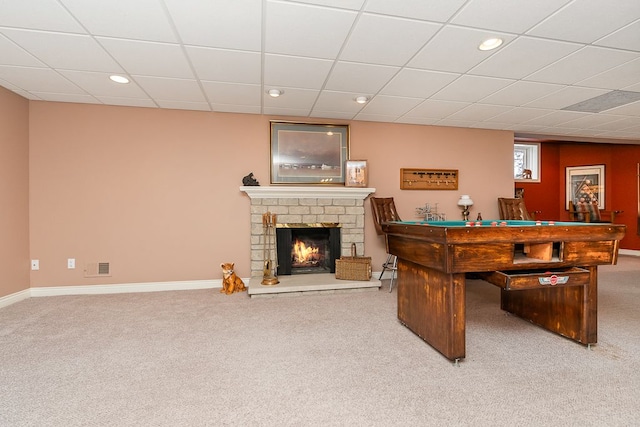 playroom featuring a warm lit fireplace, recessed lighting, carpet flooring, and baseboards