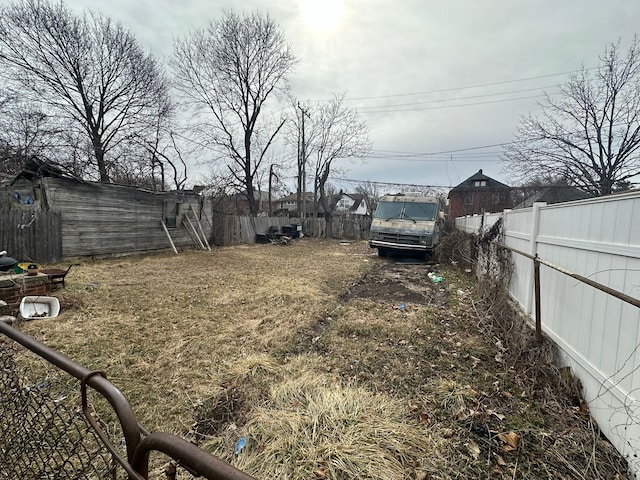 view of yard with fence