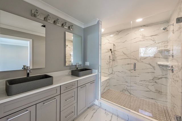 bathroom with marble finish floor, ornamental molding, a sink, and a marble finish shower