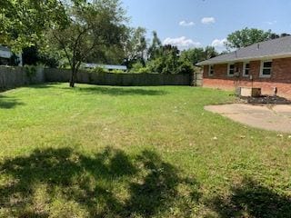 view of yard featuring a fenced backyard