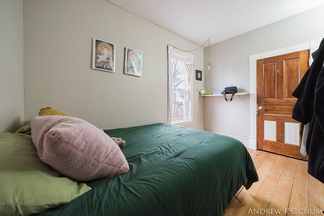 bedroom featuring light wood-style flooring