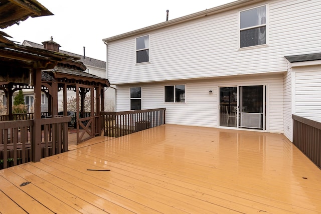 wooden deck with a gazebo