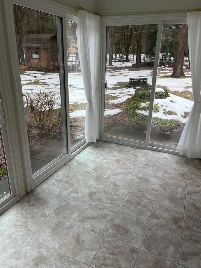 2539 W Giles Rd, Muskegon, MI 49445 - unfurnished sunroom featuring plenty of natural light