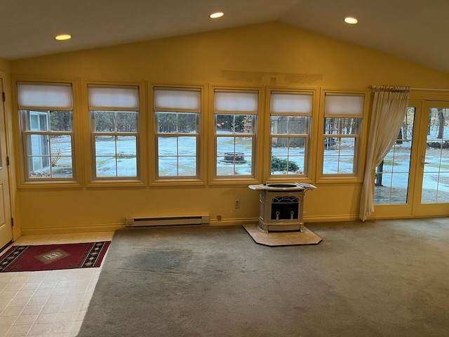 2539 W Giles Rd, Muskegon, MI 49445 - unfurnished sunroom featuring baseboard heating, vaulted ceiling, a wood stove, and french doors