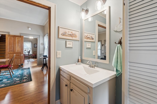 bathroom featuring vanity and wood finished floors