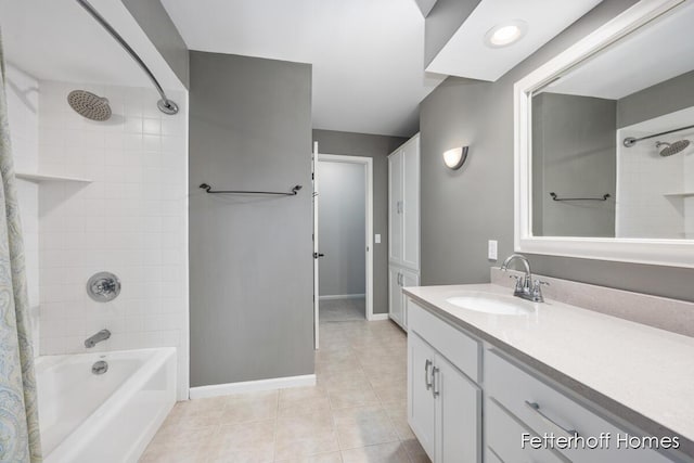 full bathroom featuring shower / bathtub combination with curtain, vanity, baseboards, and tile patterned floors