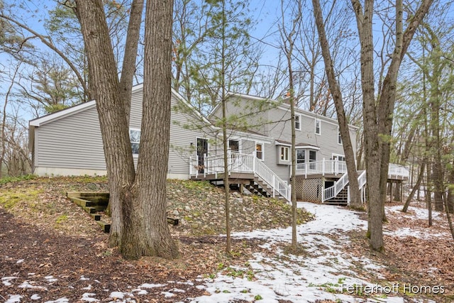 exterior space with stairs and a wooden deck